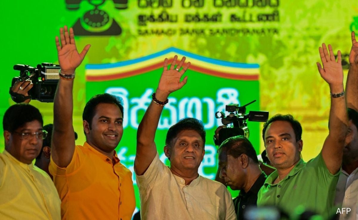 Sri Lankas Samagi Jana Balawegaya party leader Sajith Premadasa waves to supporters. Sri Lankas Samagi Jana Balawegaya party leader Sajith Premadasa waves to supporters.